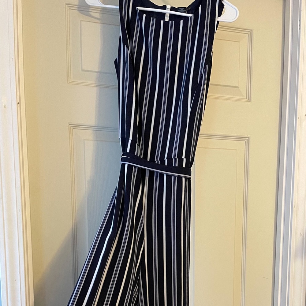 Navy sleeveless Jumpsuit with Pinstripes. Only worn once! Super comfortable!